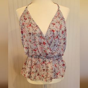 Daytrip size lg deep v neck racerback with an  elastic waisted peplum